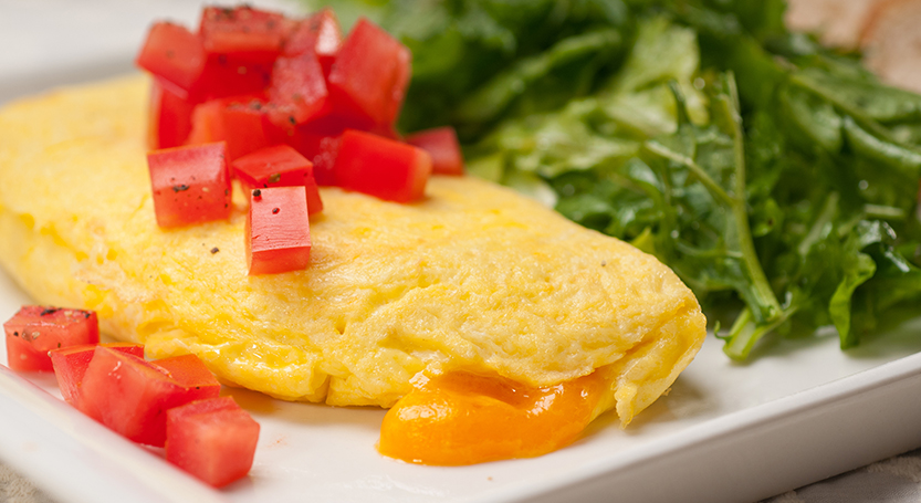 Omelette de queso acompañado de arúgula - Vidactual